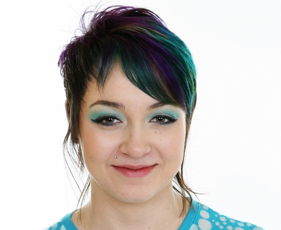 dark blue and green highlights on dark hair