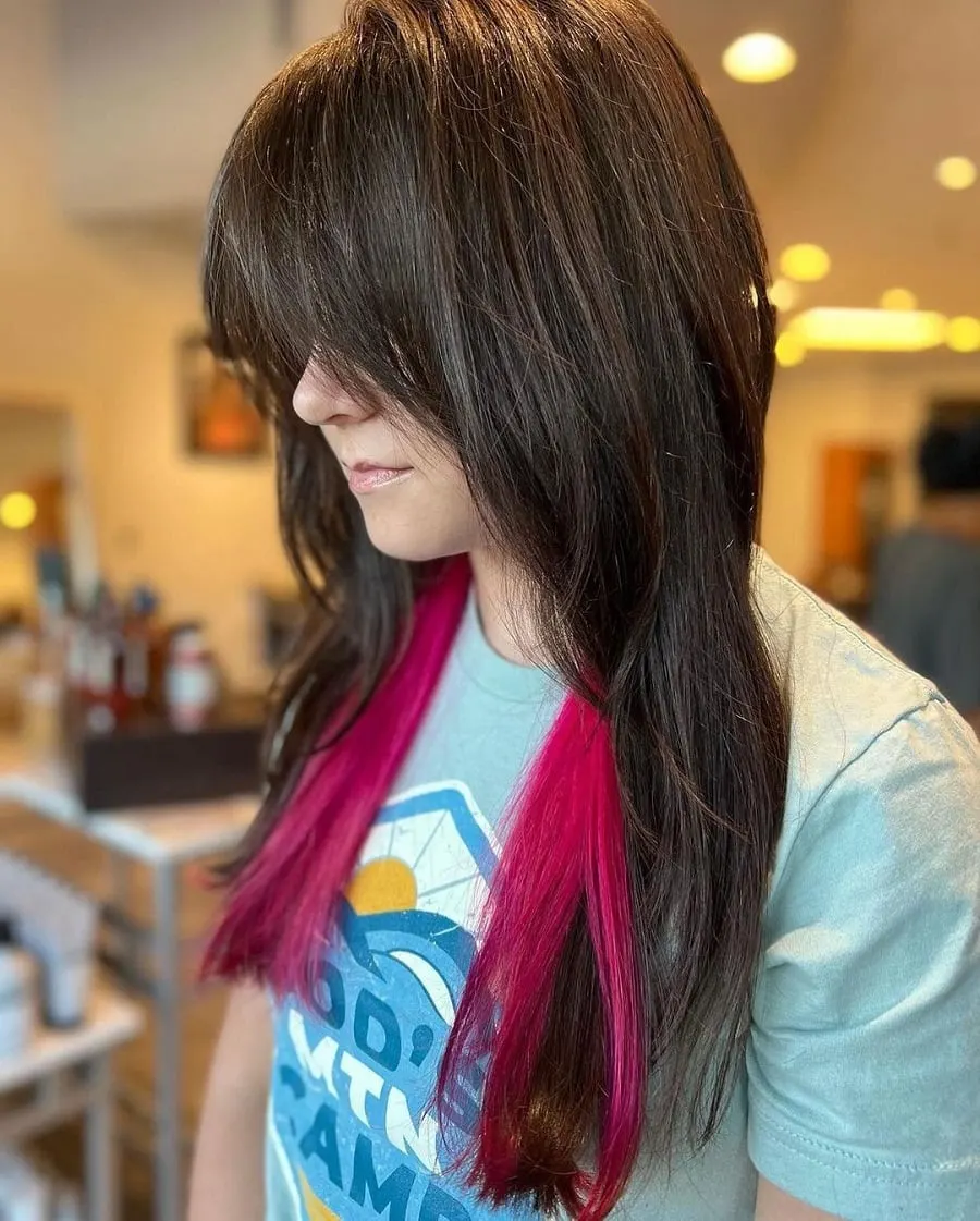 dark brown hair with magenta pink underneath