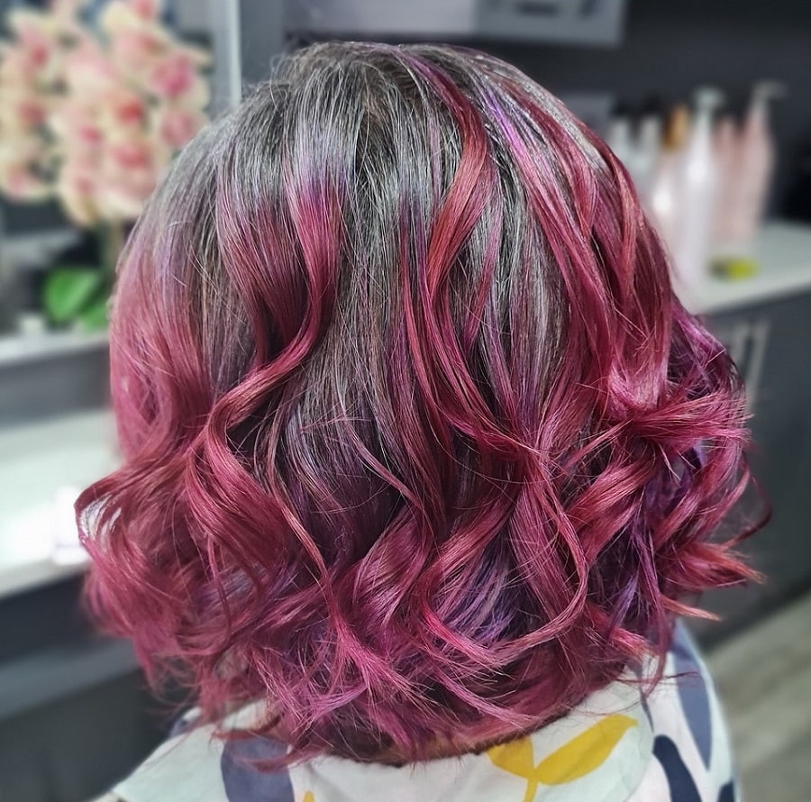dark gray hair with magenta pink highlights