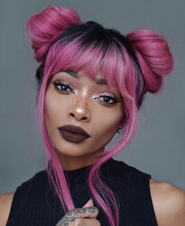space bun on dark pink hair