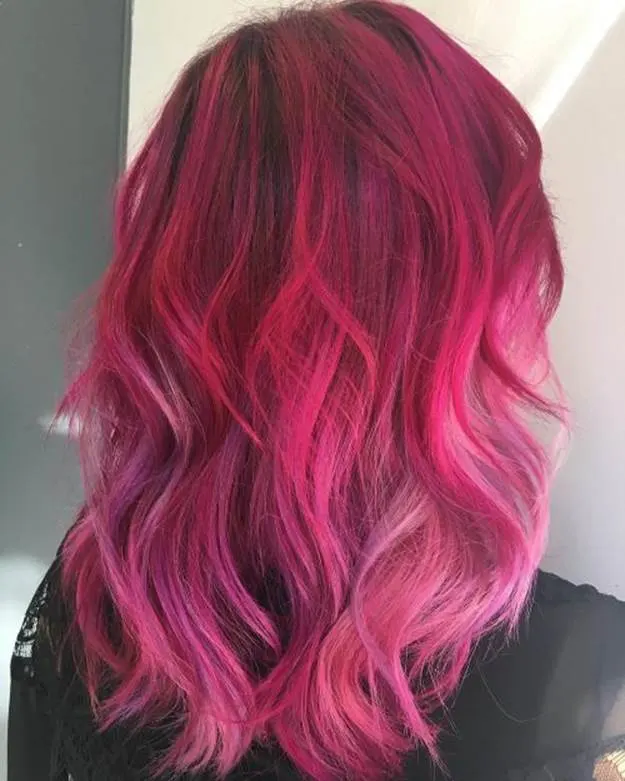 wavy dark pink hair
