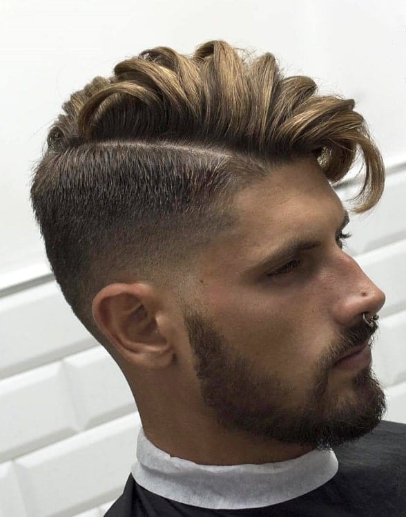 disconnected fade with side part comb over