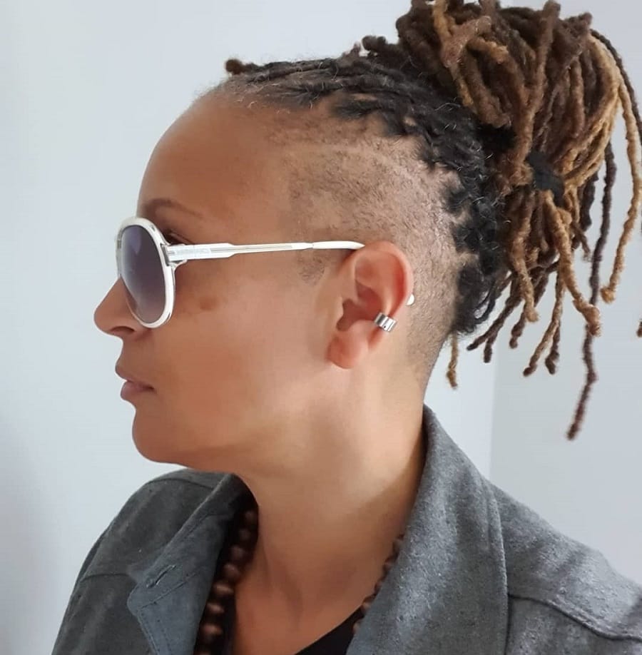 dreads updo with shaved sides
