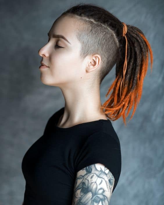 dread ponytail with shaved side