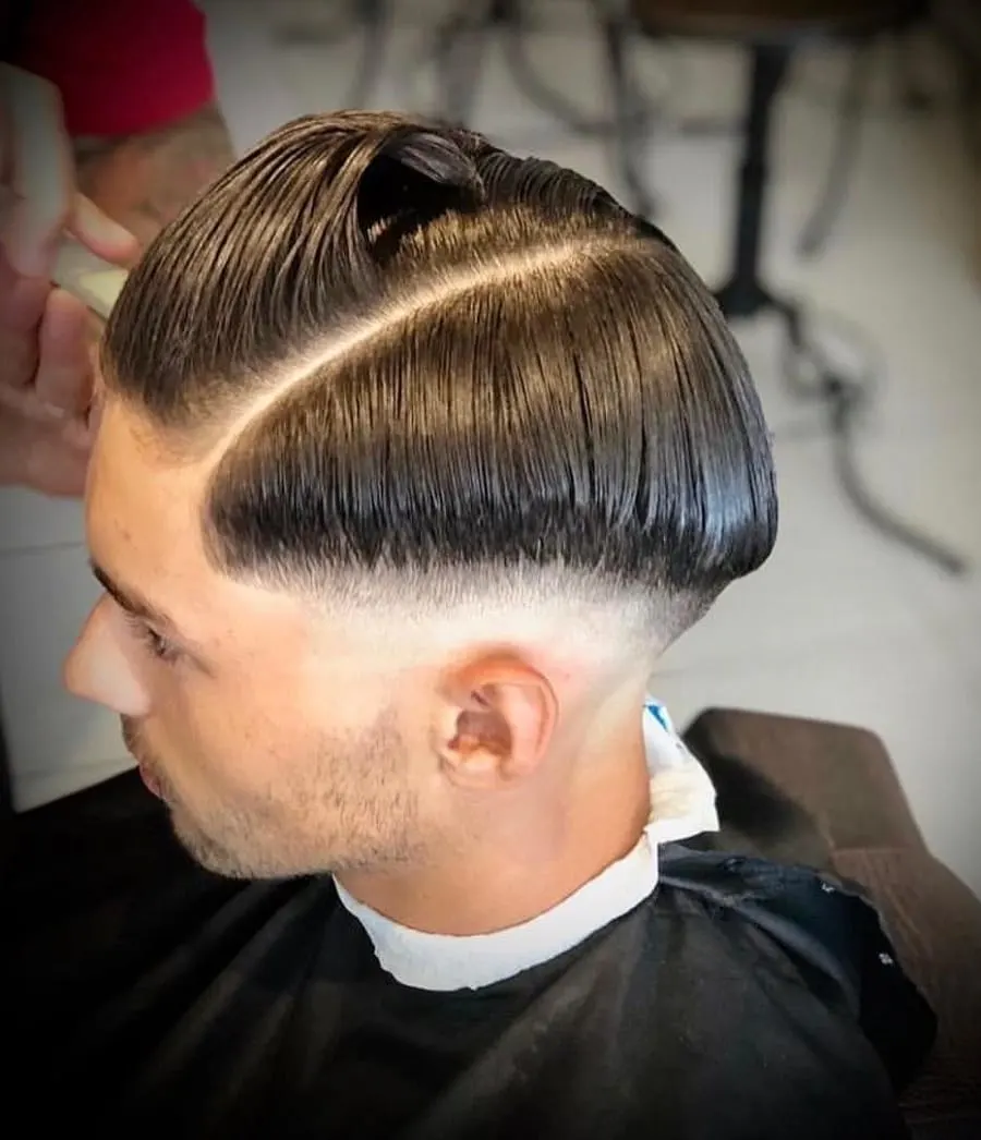 ducktail haircut with side part