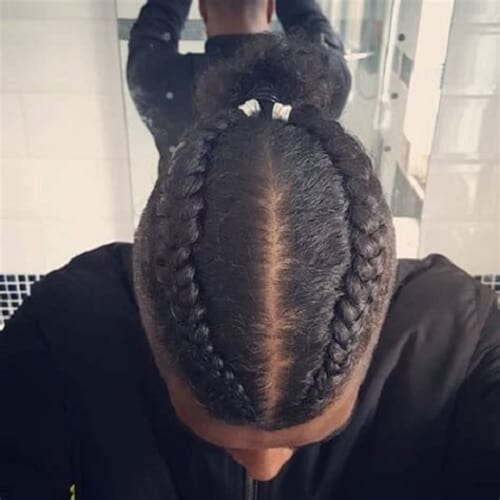 twin dutch braids with middle part