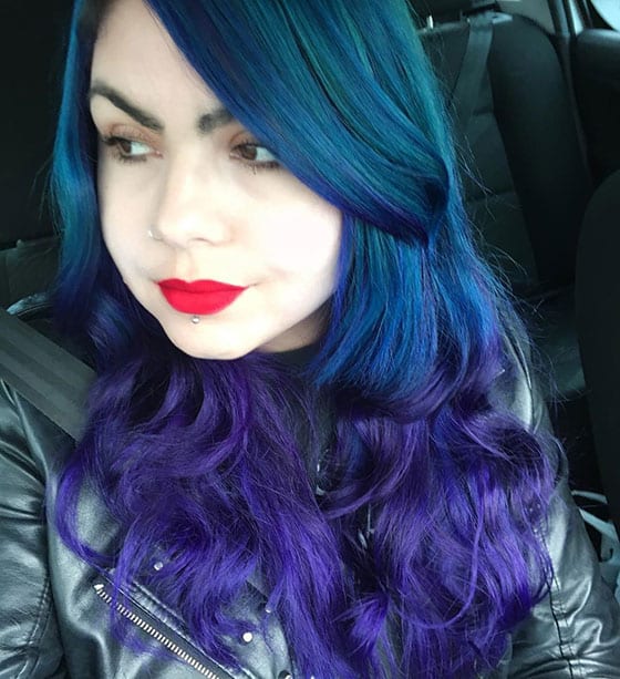 Blue and purple hair with face-framing bangs 