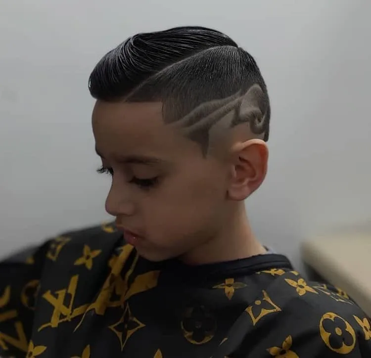 fade haircut with design for little boy 