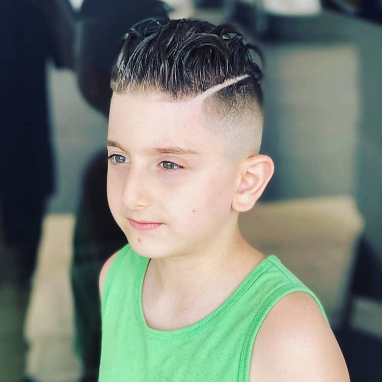 slicked back fade haircut for little boy 