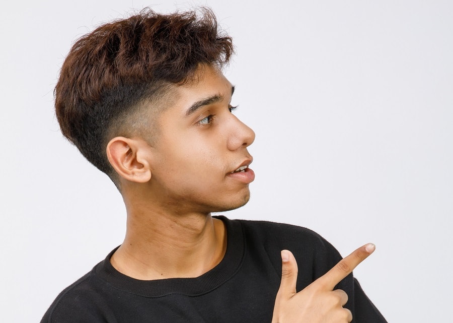 Fade haircut for young men with round faces