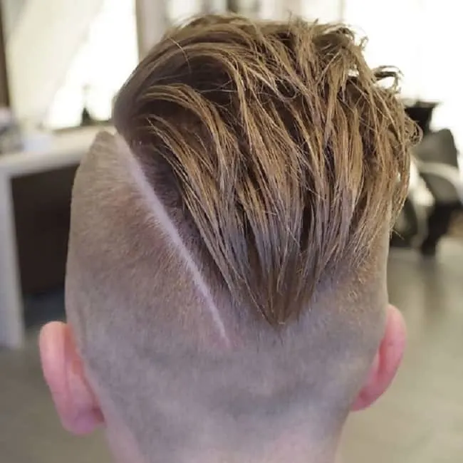 slicked back fade with line