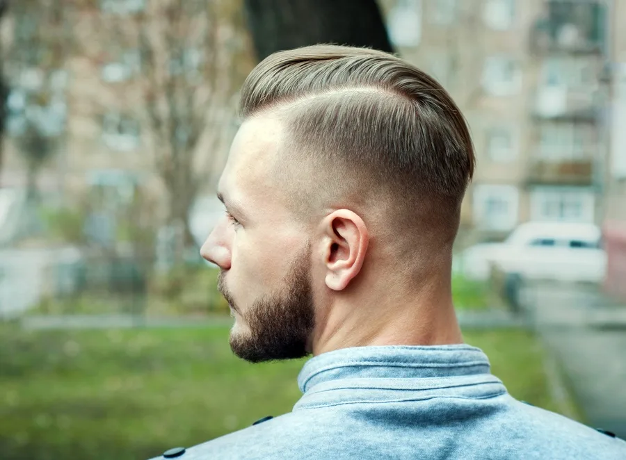 mid fade with side part for white guys
