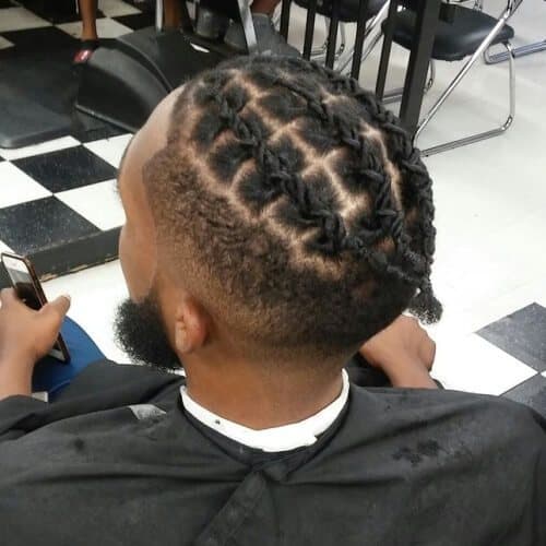 men's braided hairstyle with fade