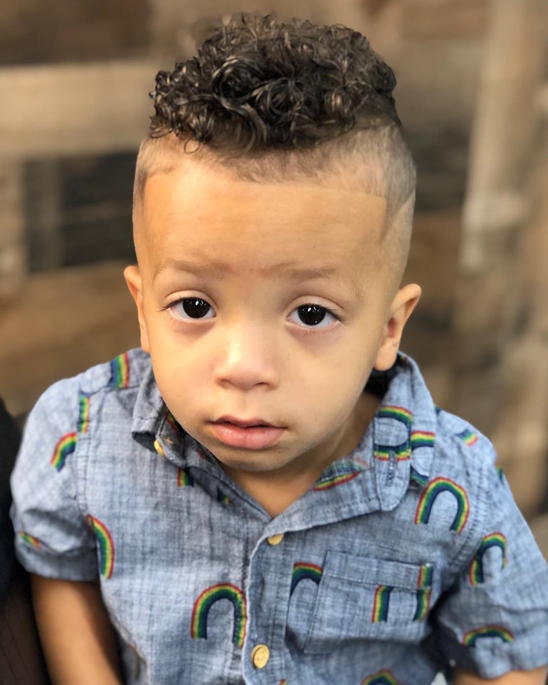 xurly faded mohawk haircut for black baby boy with a crisp line-up