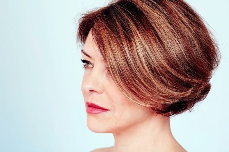 dark brown feathered bob with highlights