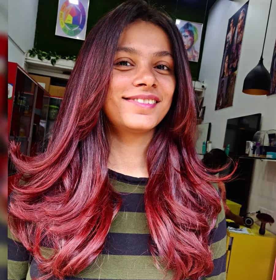feathered dark pink hair