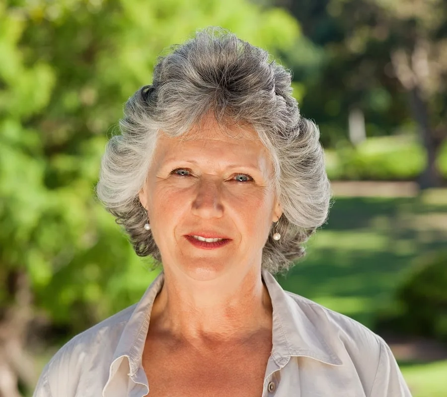 feathered grey hair with bangs