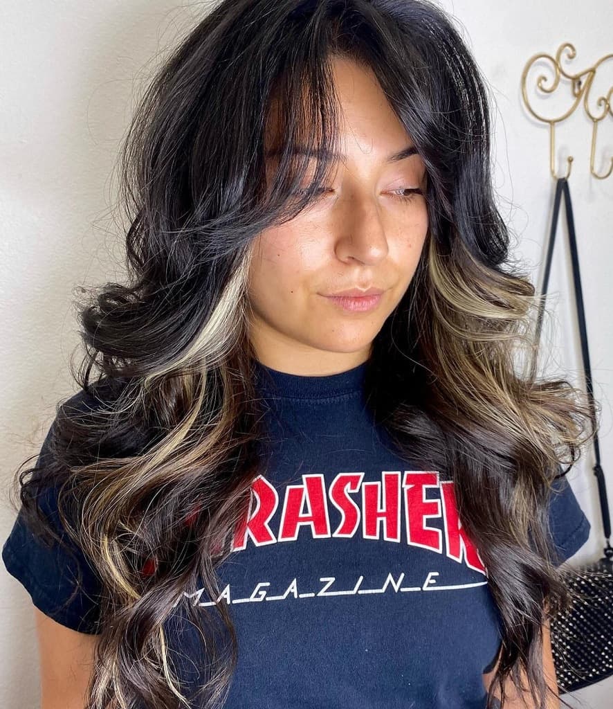 feathered hair with highlights