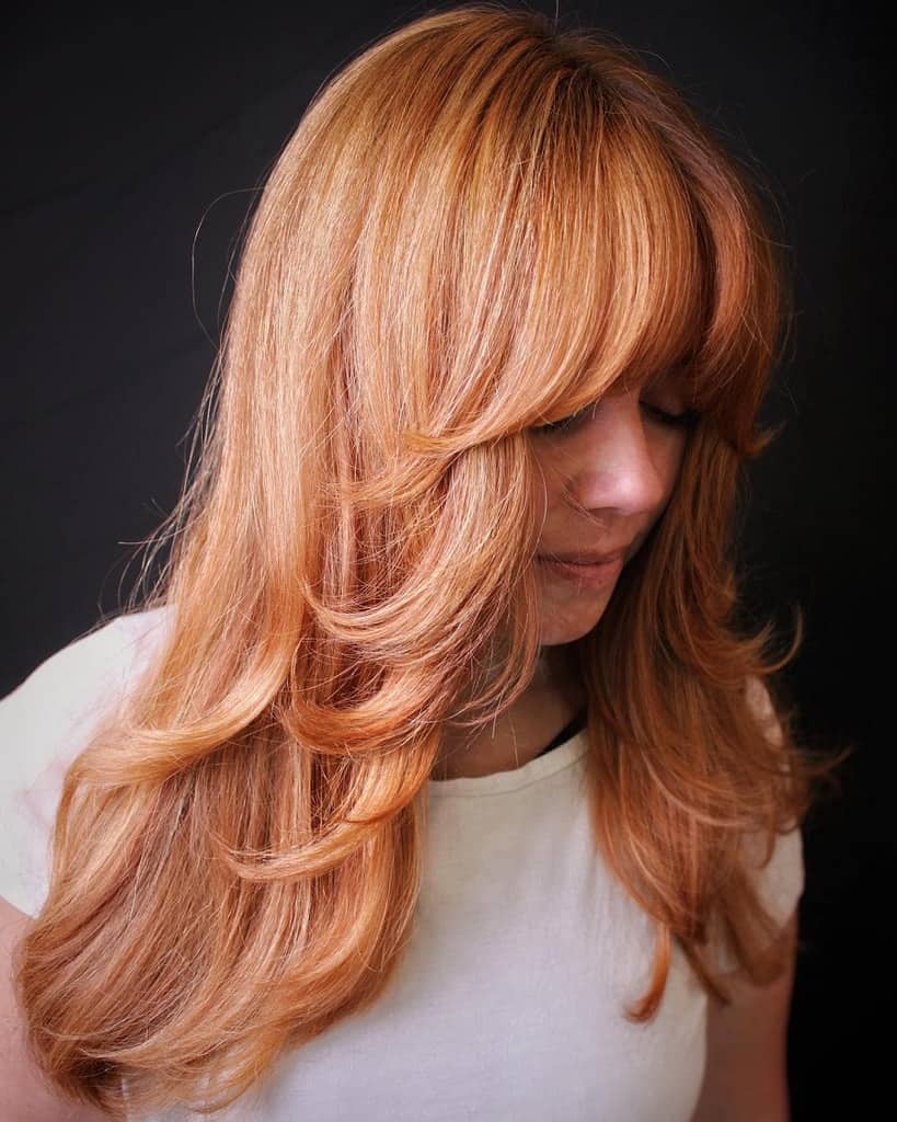 feathered strawberry blonde hair