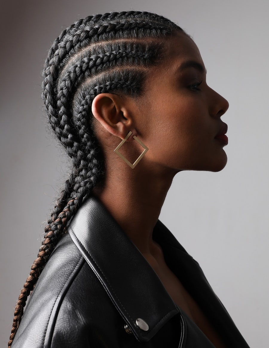 female biker with cornrow braids