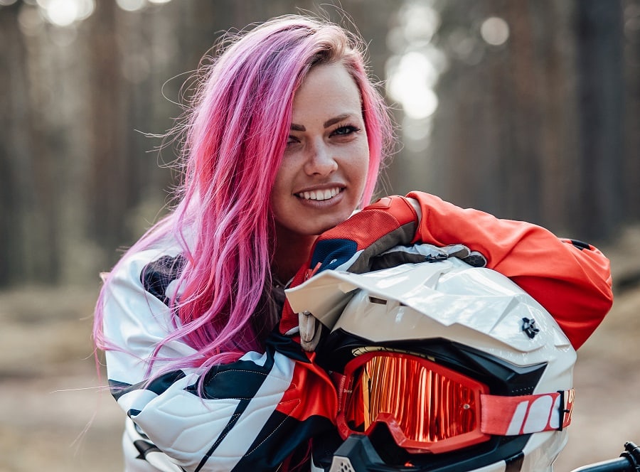 female biker with pink hair