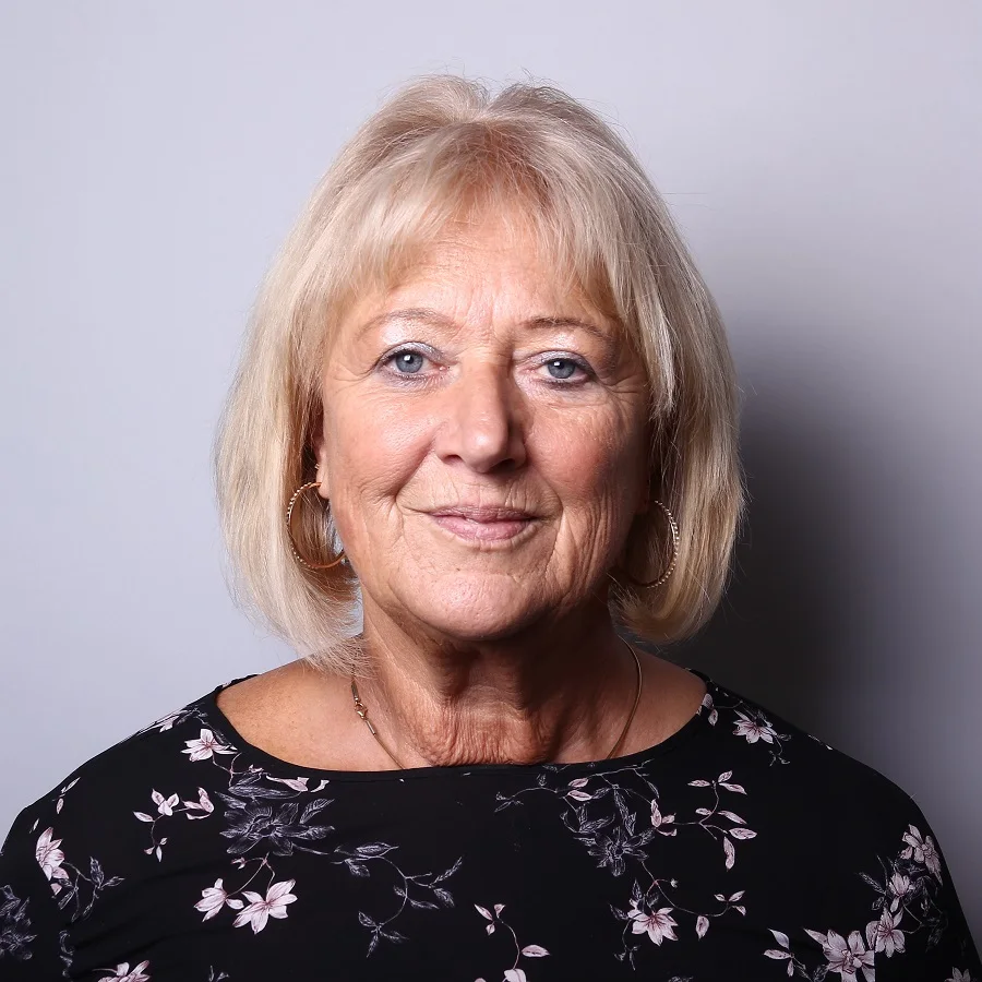 fine bob with bangs for women over 50