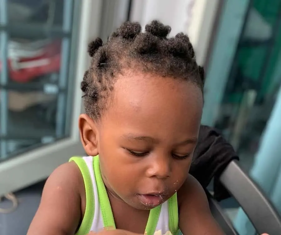 black baby boy first haircut