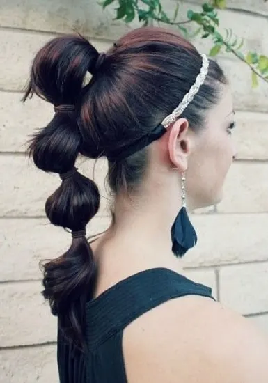 french braided ponytail with poof