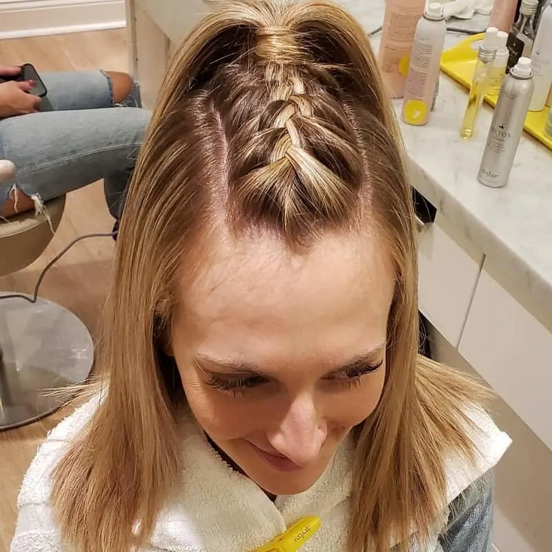 french braided half up ponytail
