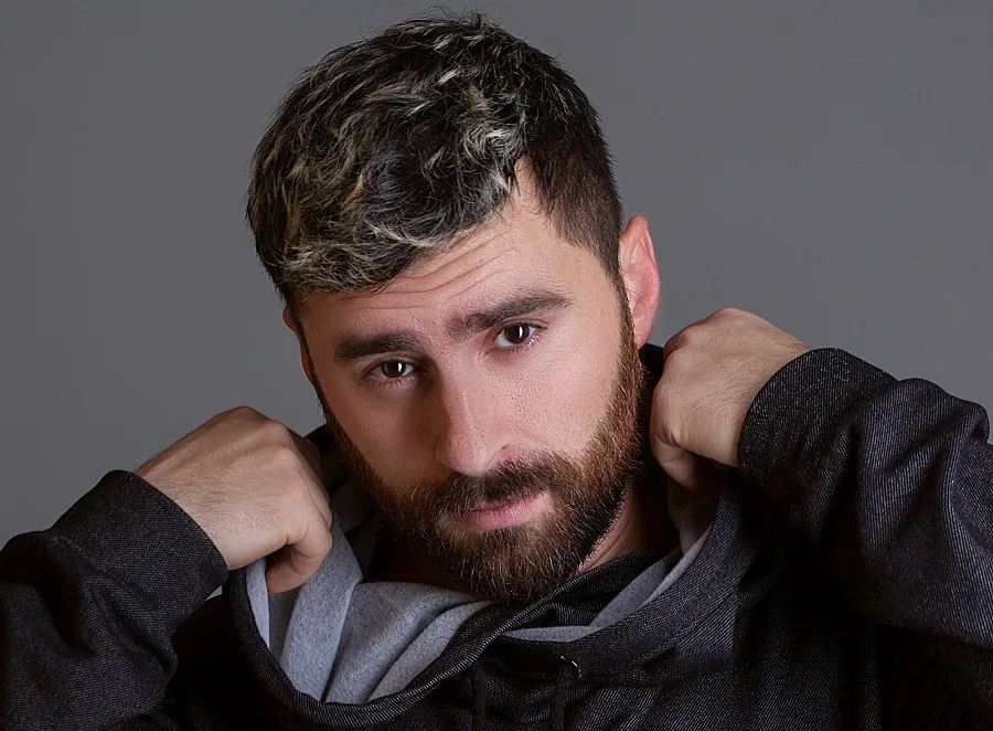 frosted tips hairstyle with beard