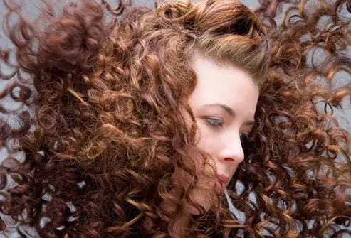 curly long brown hairstyle for women 