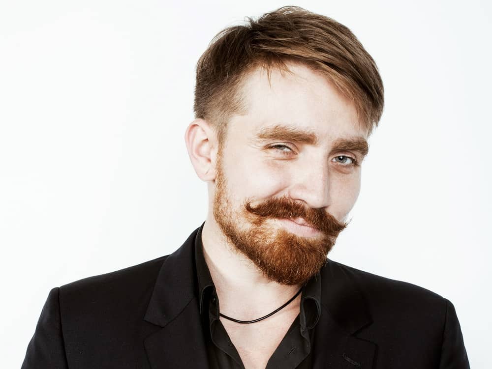 ginger beard with handlebar mustache