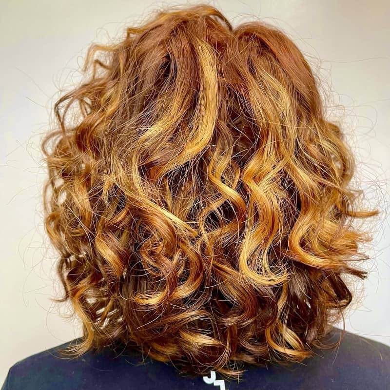 ginger curls with golden blonde highlights