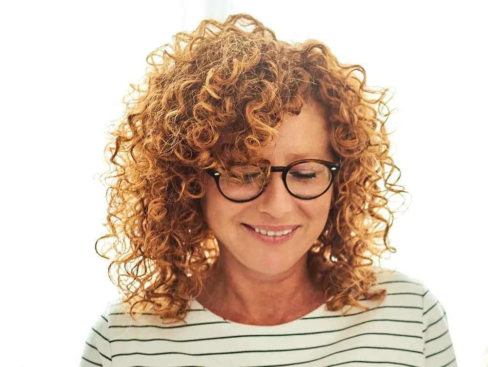 ginger curls with side part