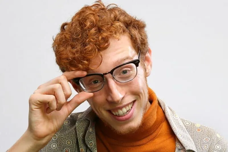 ginger red curly hairstyle for men