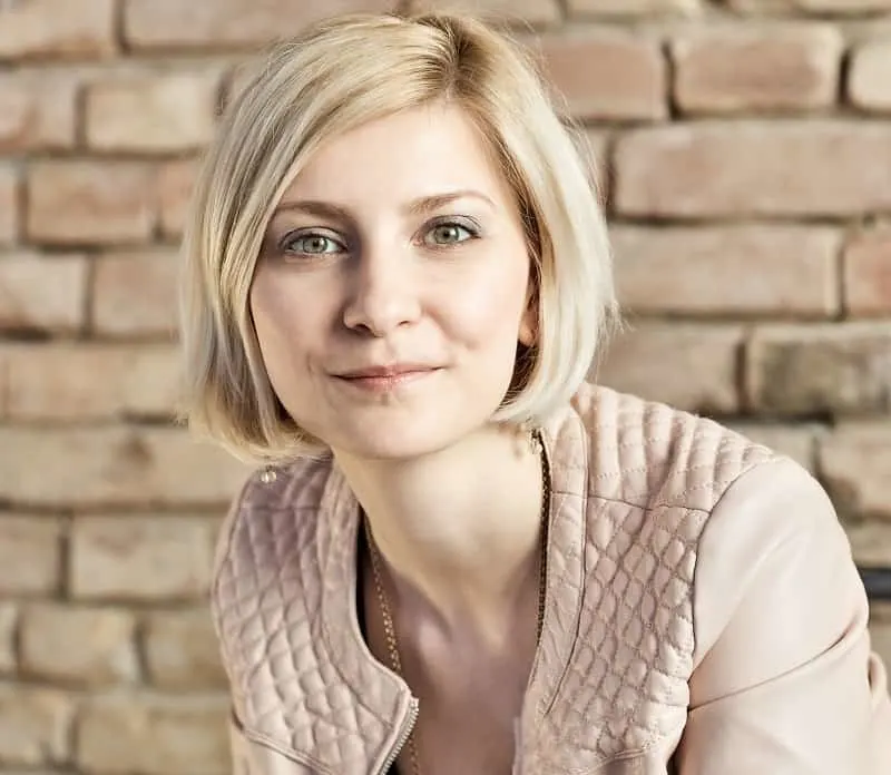 girl with ash blonde hair and green eyes