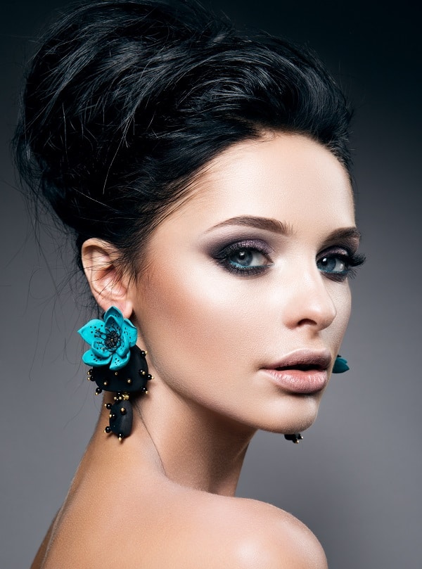 black hair updo for girls with blue eyes