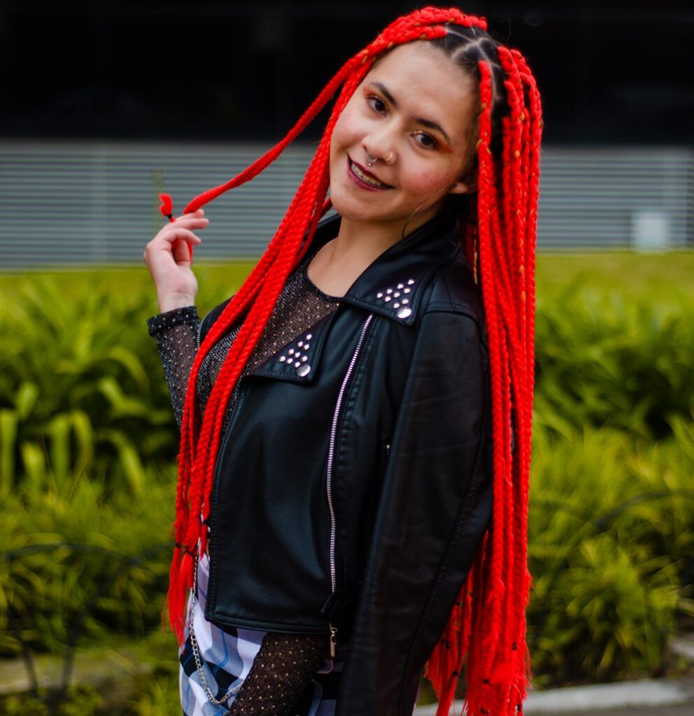 girl with waist-length box braids