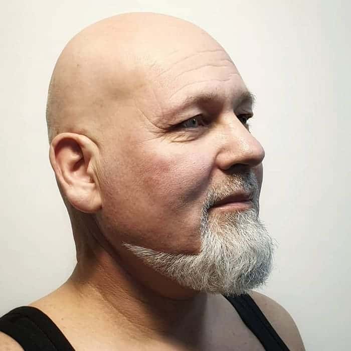 bald guy with goatee beard