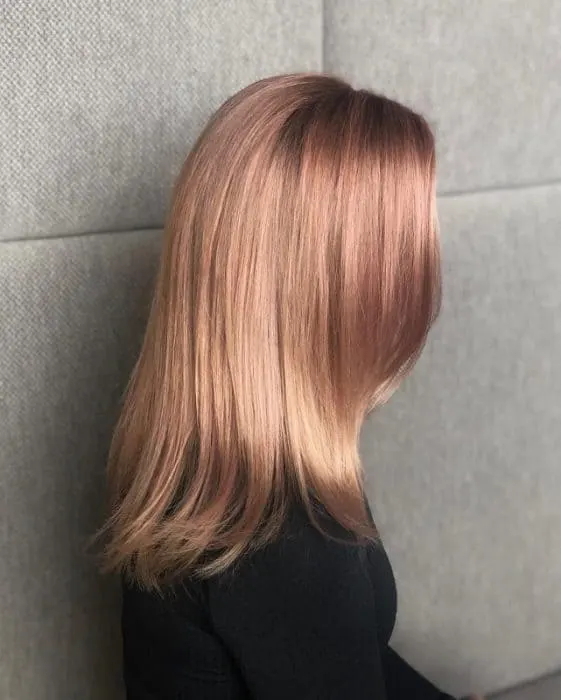 full head golden blonde highlights on rose gold hair