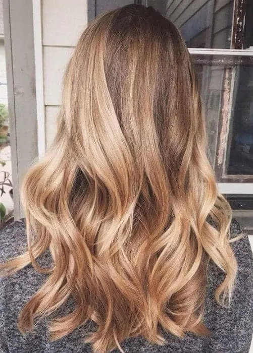Golden Blonde Wavy Hair with Highlights