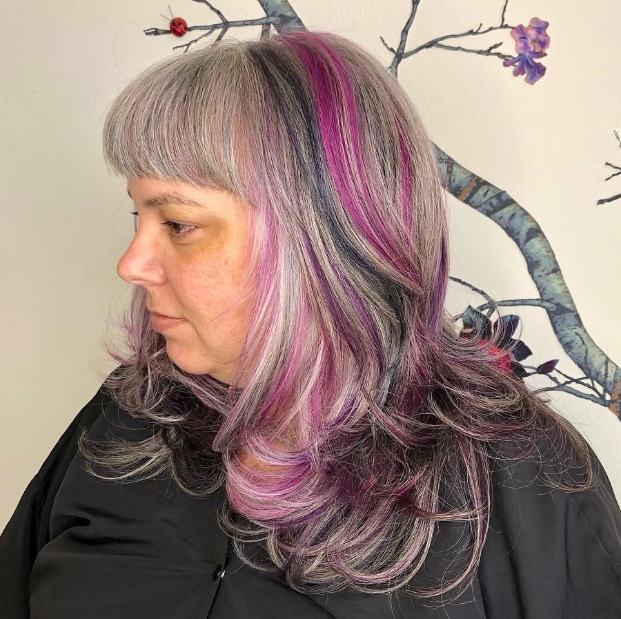 gray hair with bangs and pink highlights