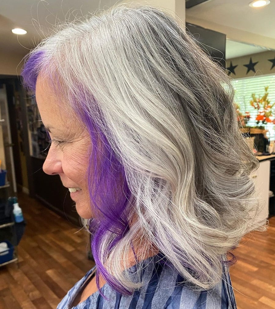 gray hair with face framing purple highlights