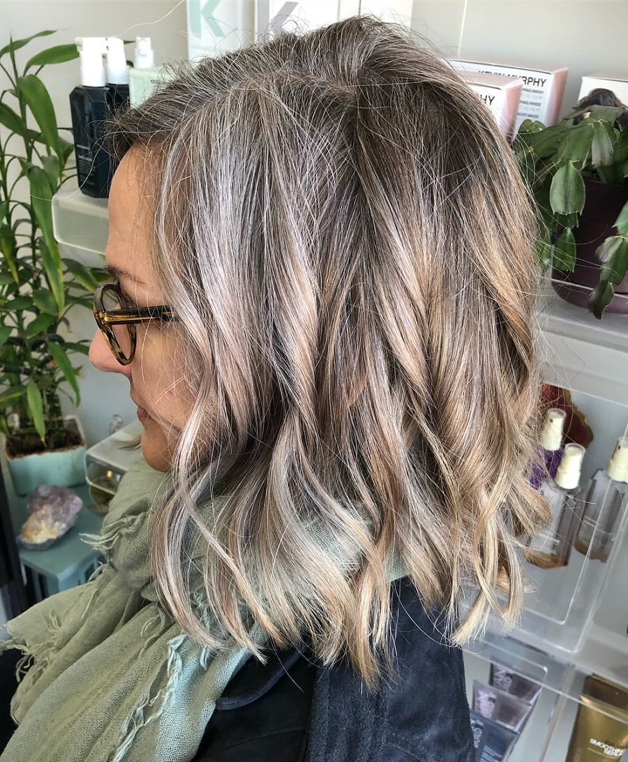 Gray wavy hair with dark highlights