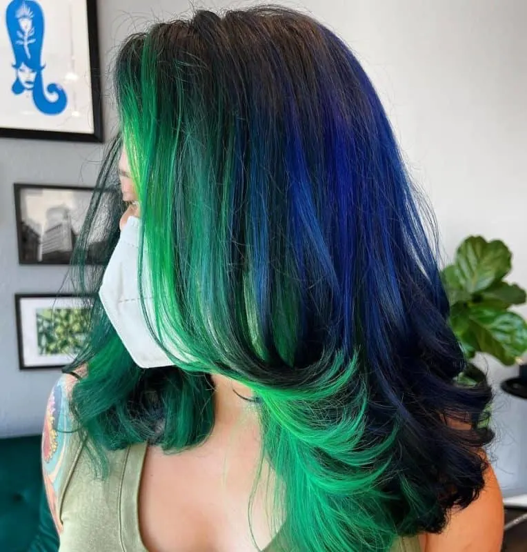 green and blue feathered hair