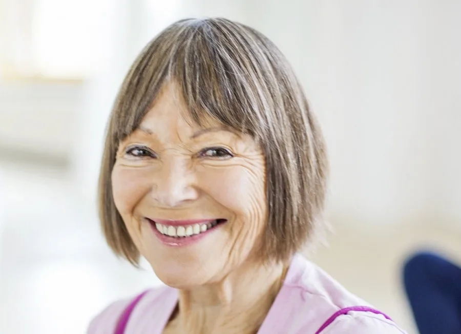 grey bob with curtain bangs