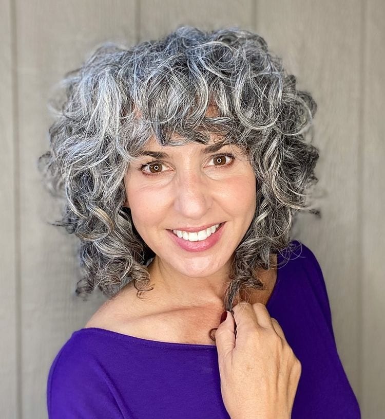 grey curly hair with bangs