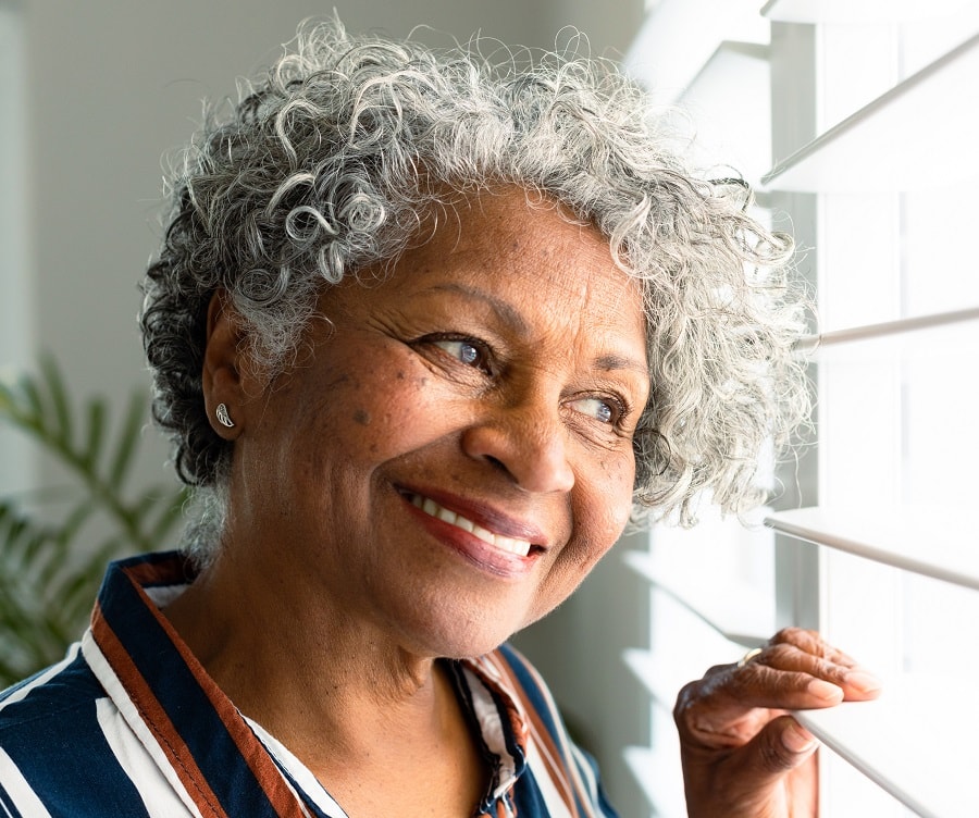 grey curly hairstyle for black women over 60
