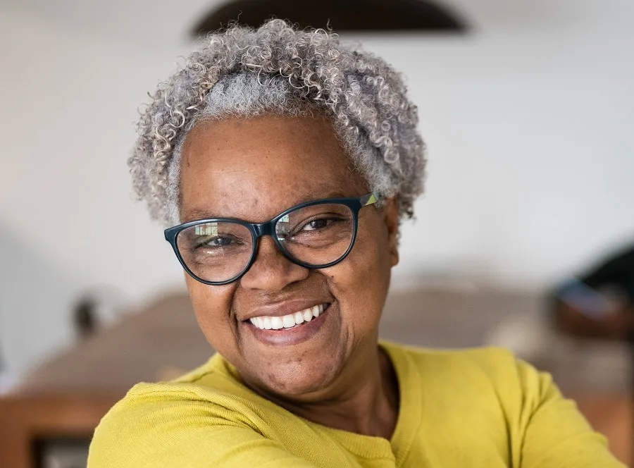grey hairstyle for black women over 50 with glasses