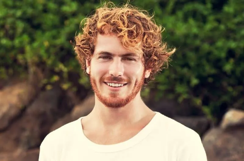 guy with messy red hair and highlights